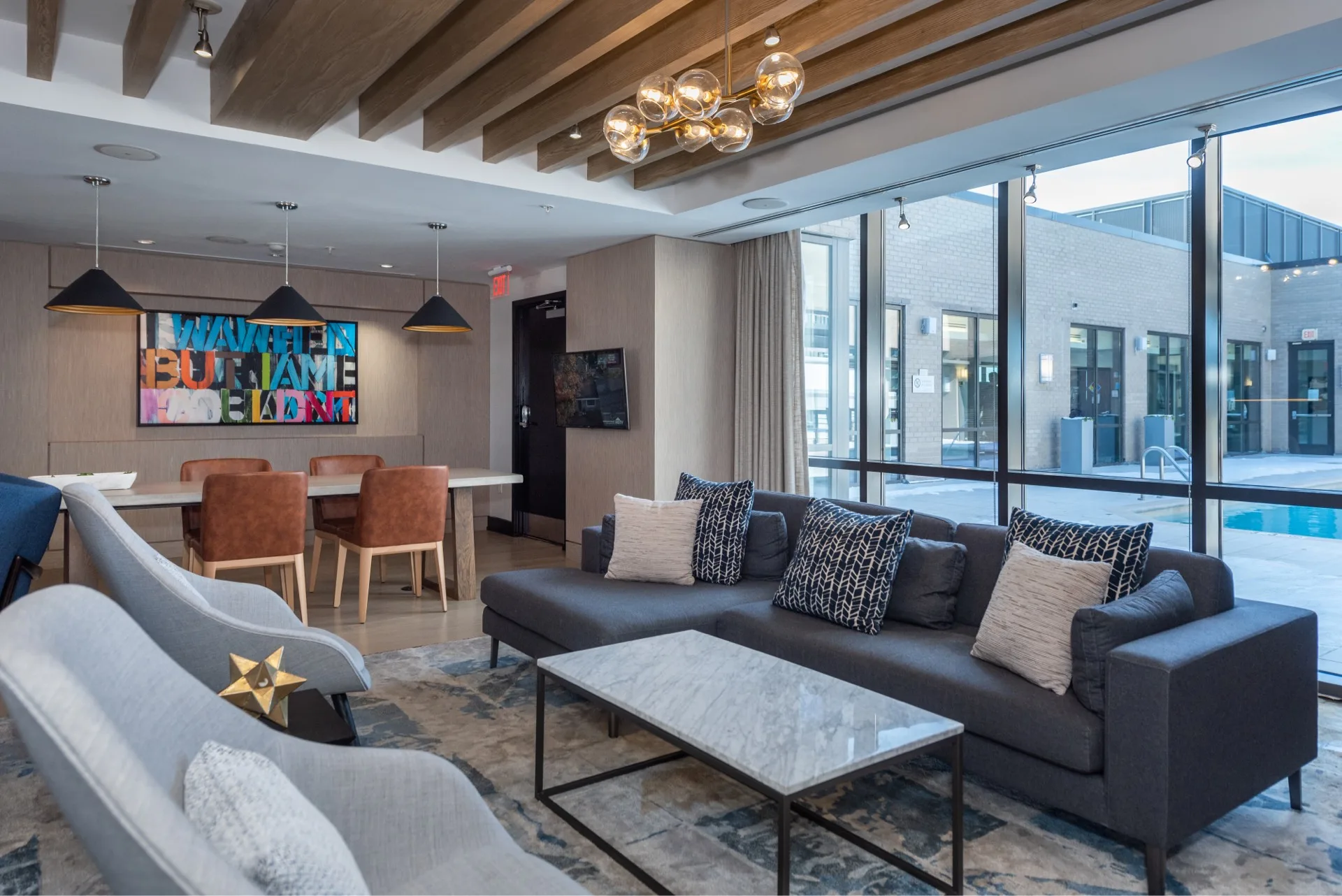 Lounge with view of outdoor pool