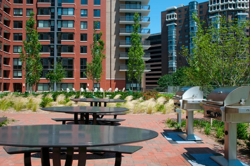 Outdoor grilling area with tables