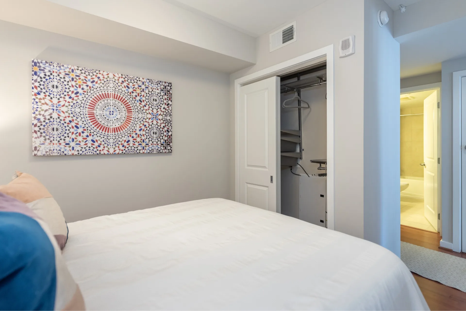 Bedroom with closet and shower